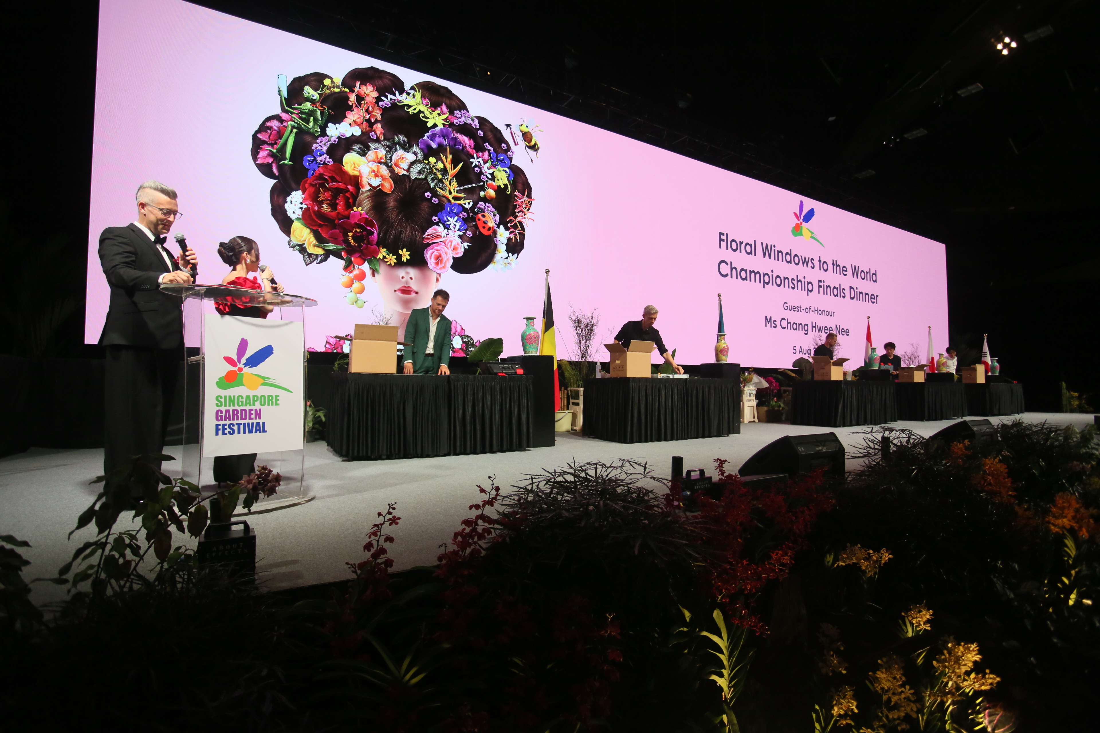 Top 5 finalists competing on stage for the FWWC Finals Dinner at SGF 2024